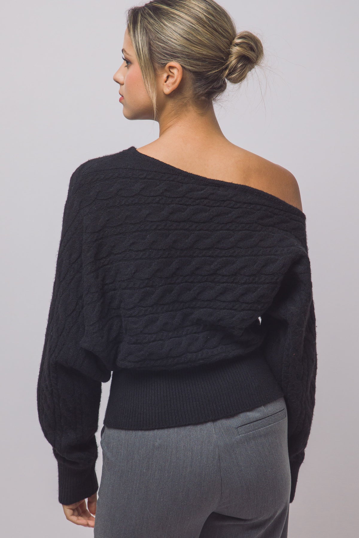Women's fitted off-shoulder knit top styled outfit