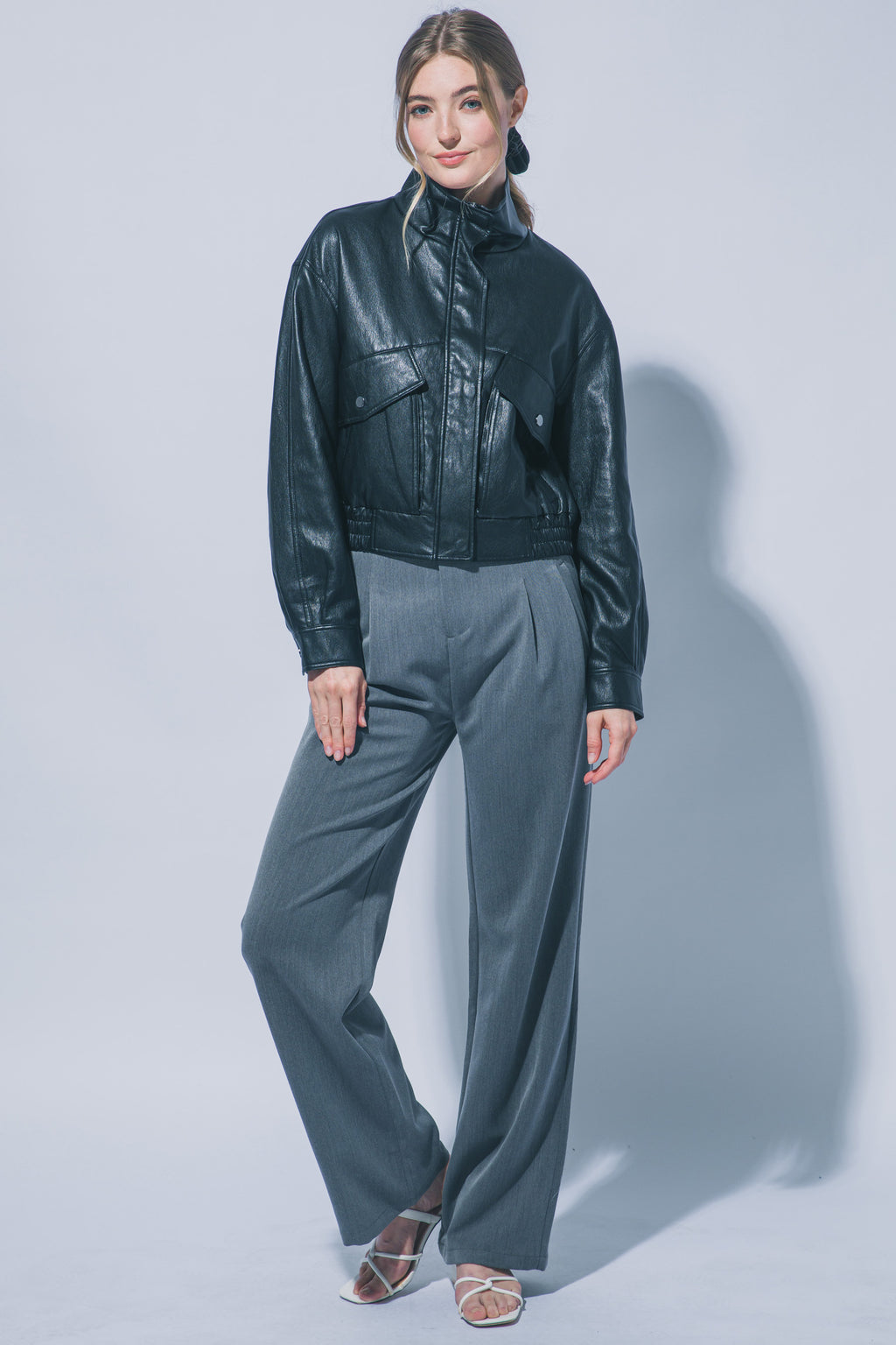 Black faux leather bomber jacket for women – styled outfit