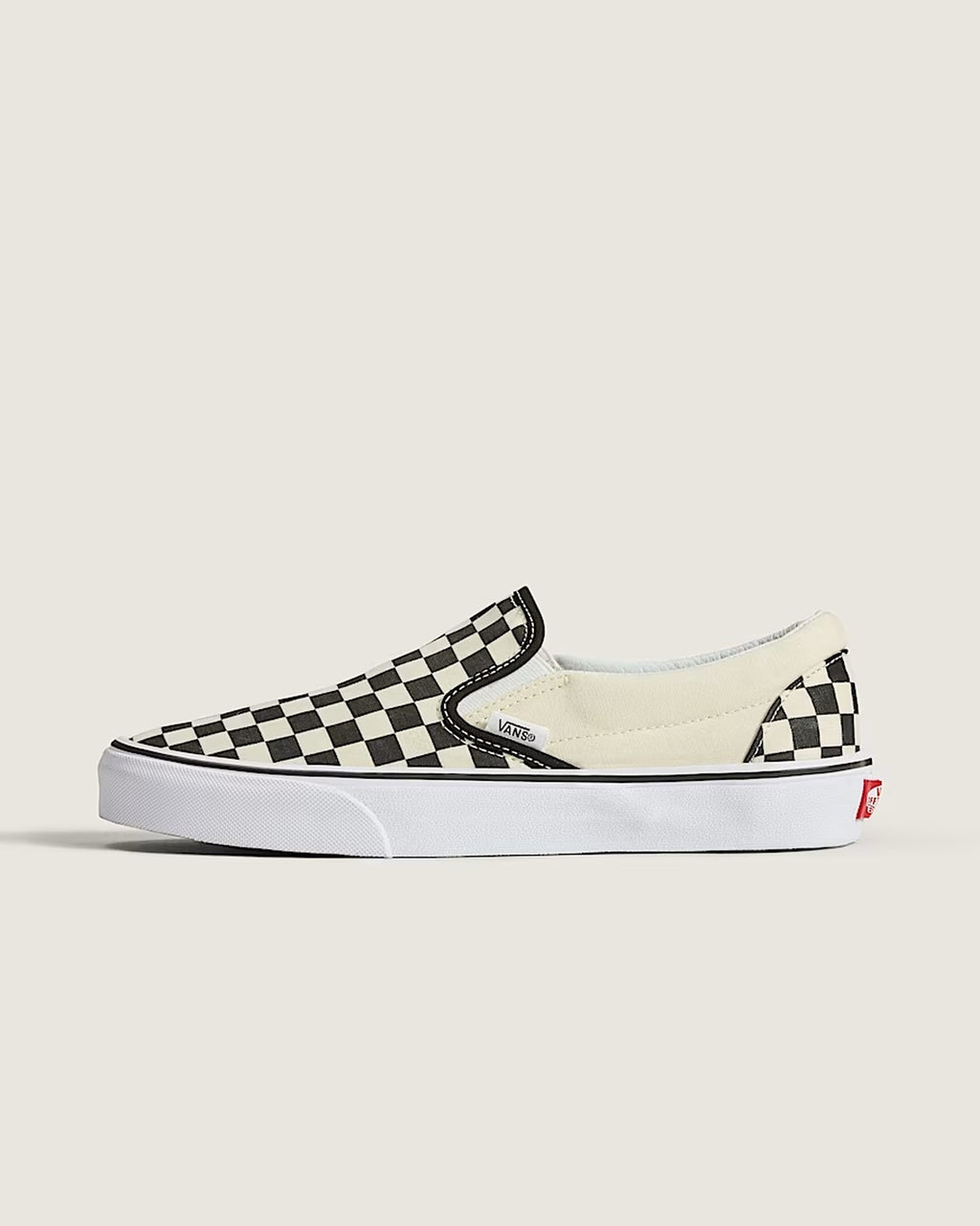 Unisex Vans checkerboard slip-on sneakers in Black & White