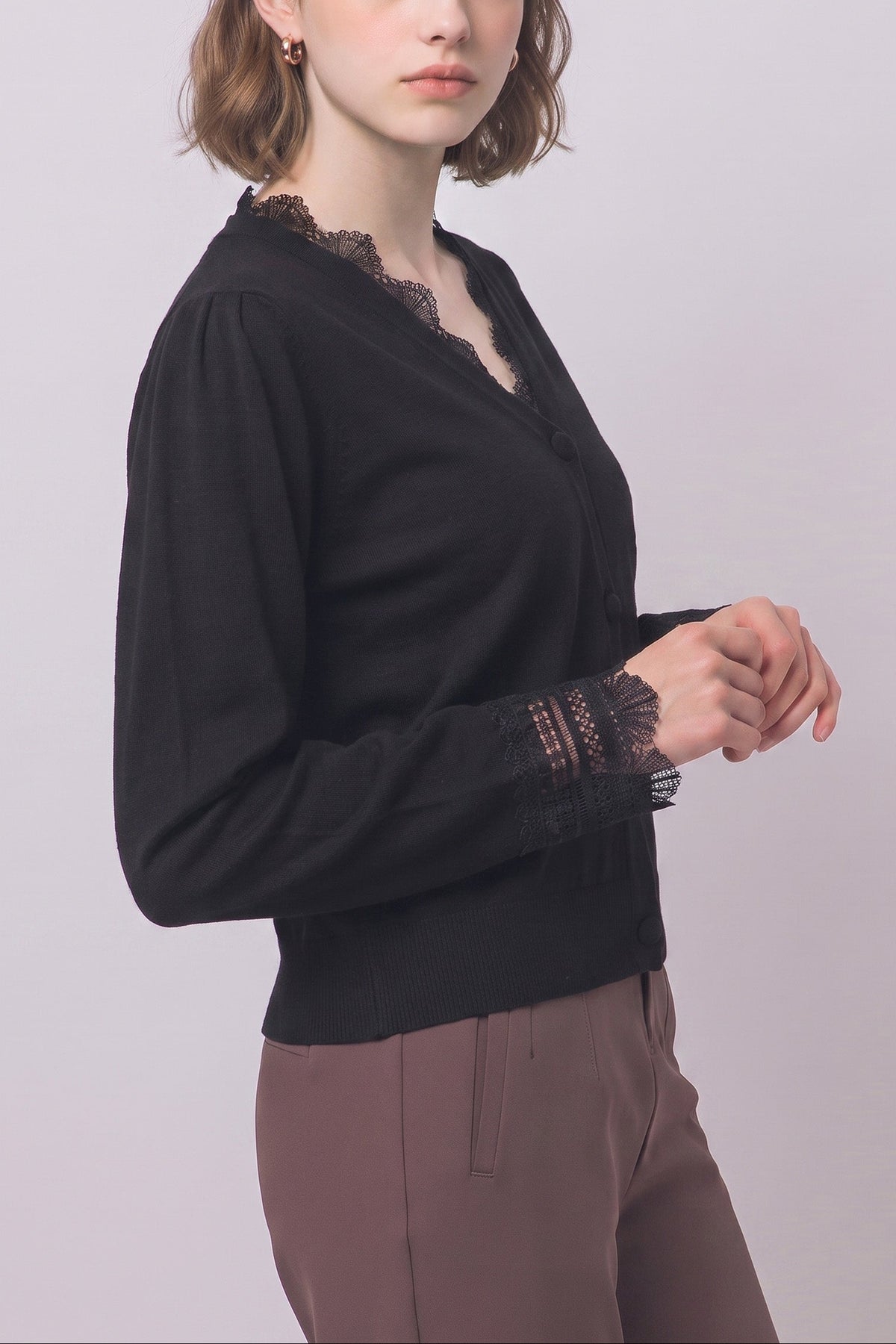 Women's lace trim knit cardigan in Black on model