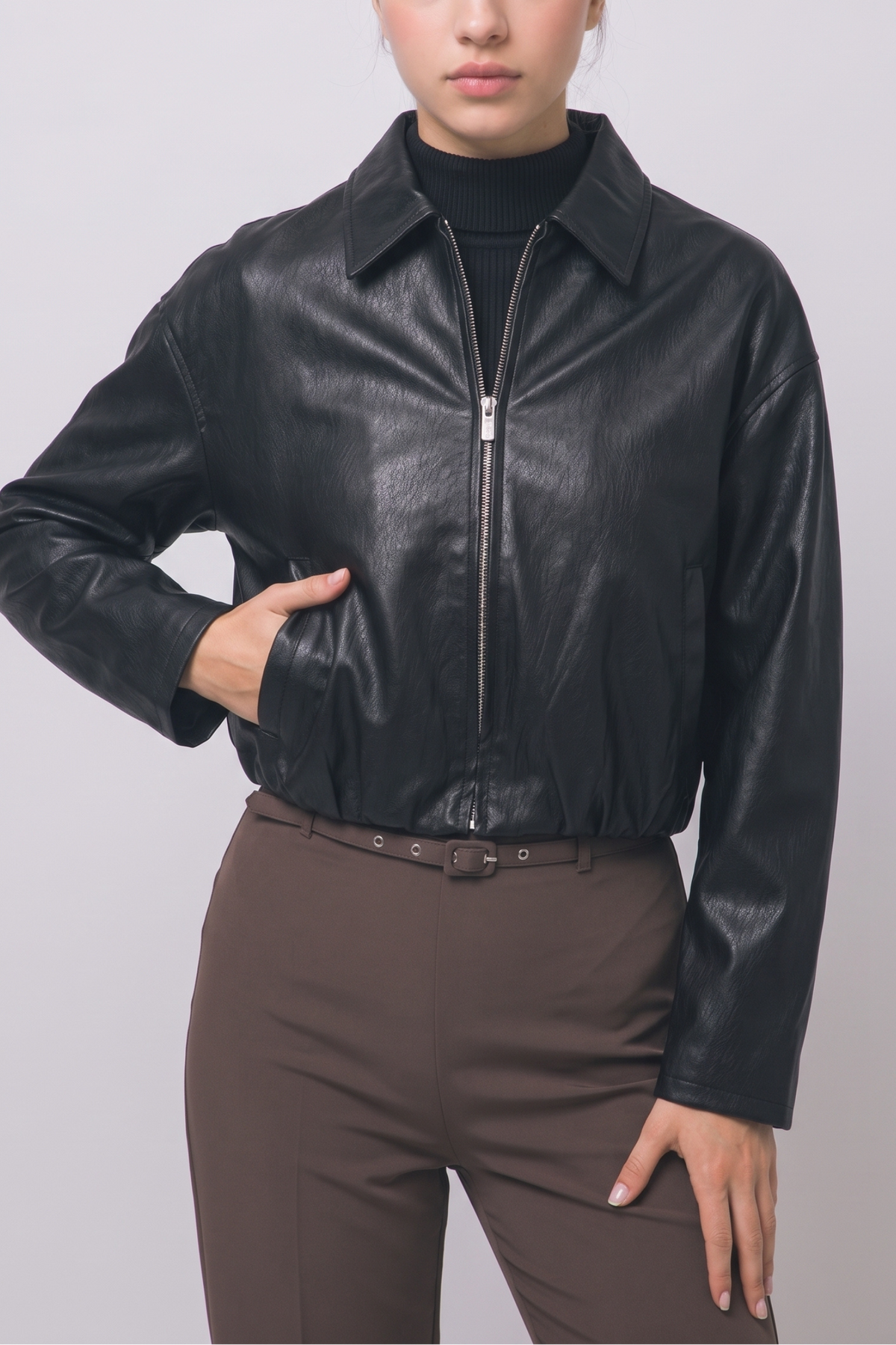 Black cropped faux leather bomber jacket with silver zip front