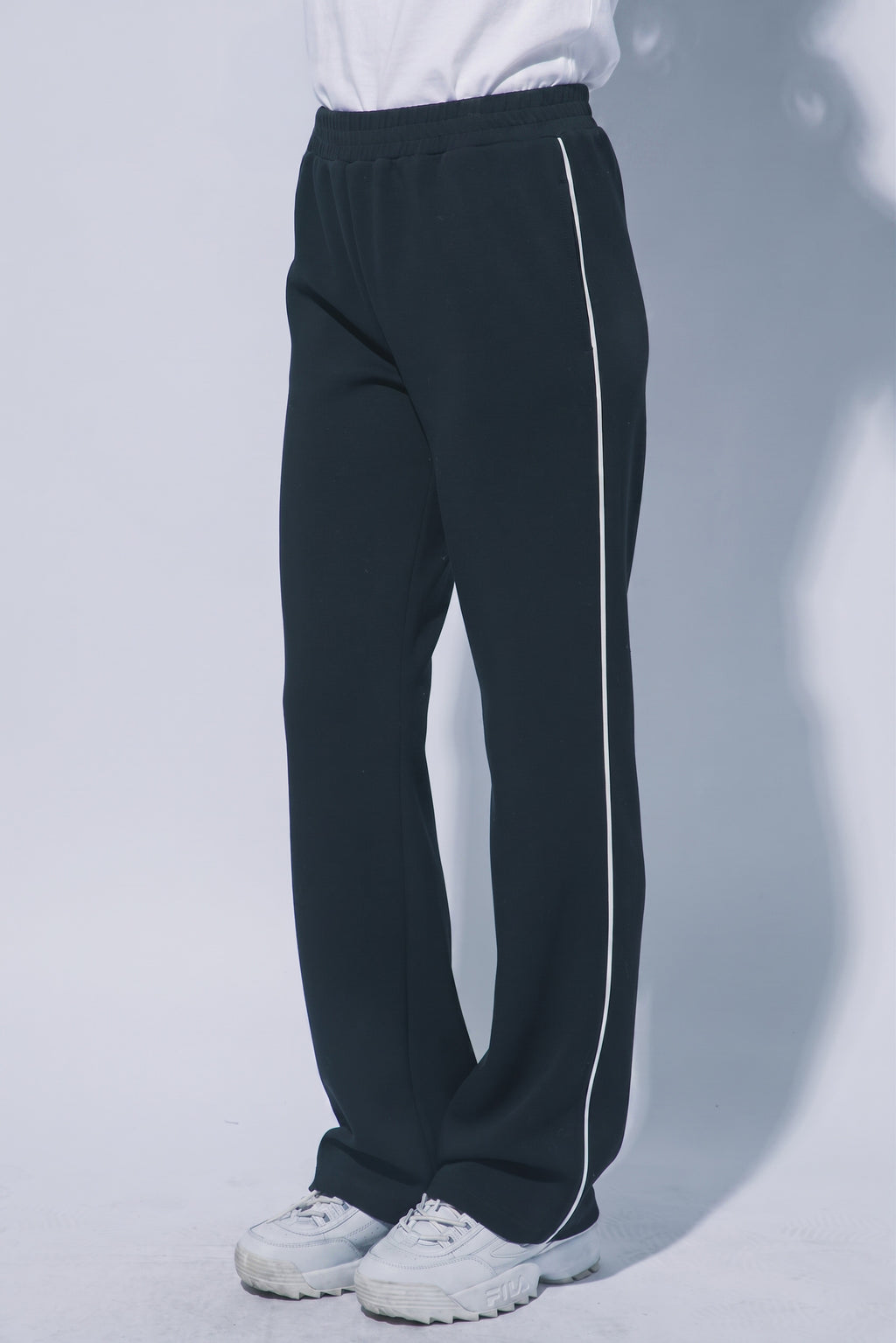 Women's black wide leg track pants with white piping