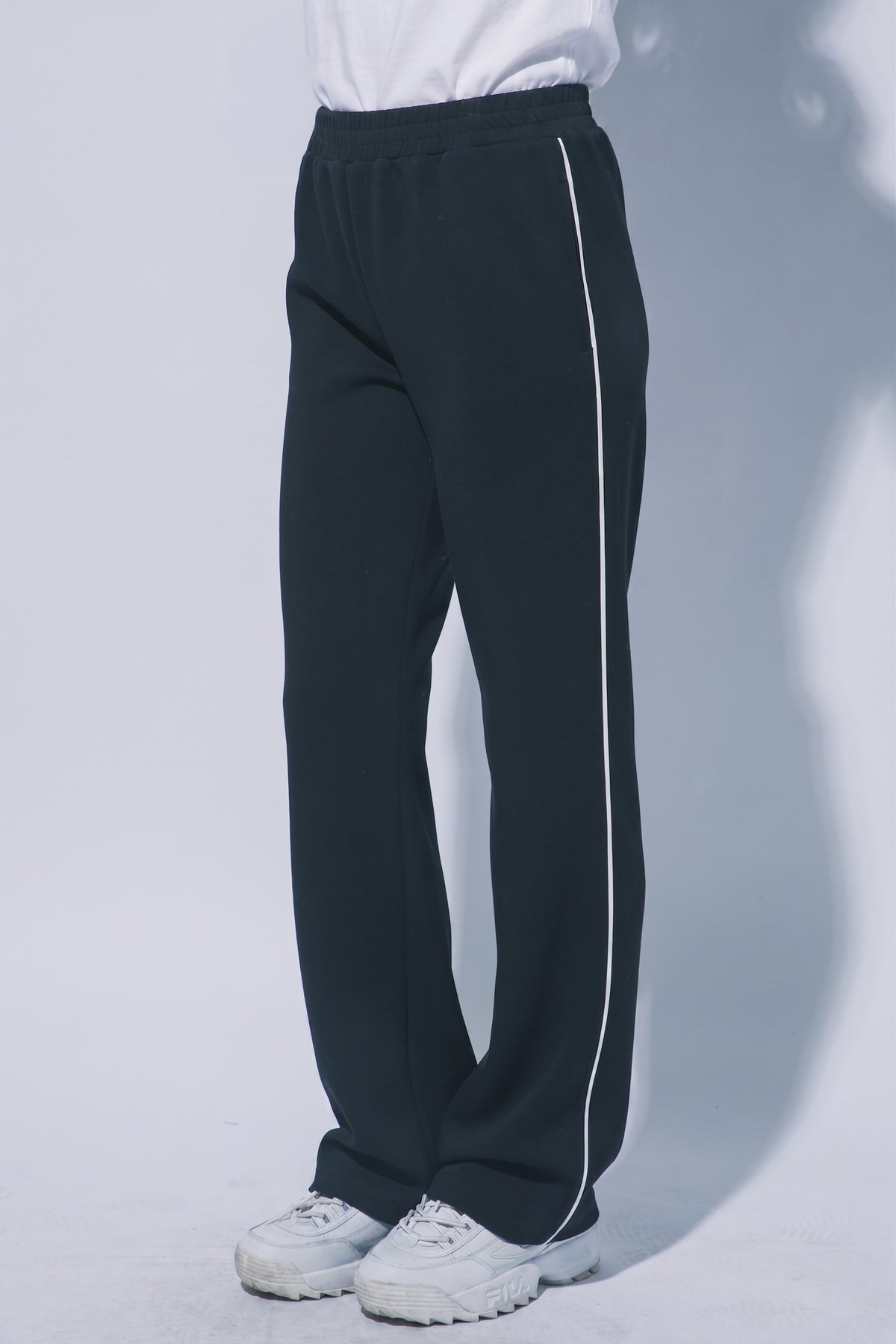 Women's black wide leg track pants with white piping
