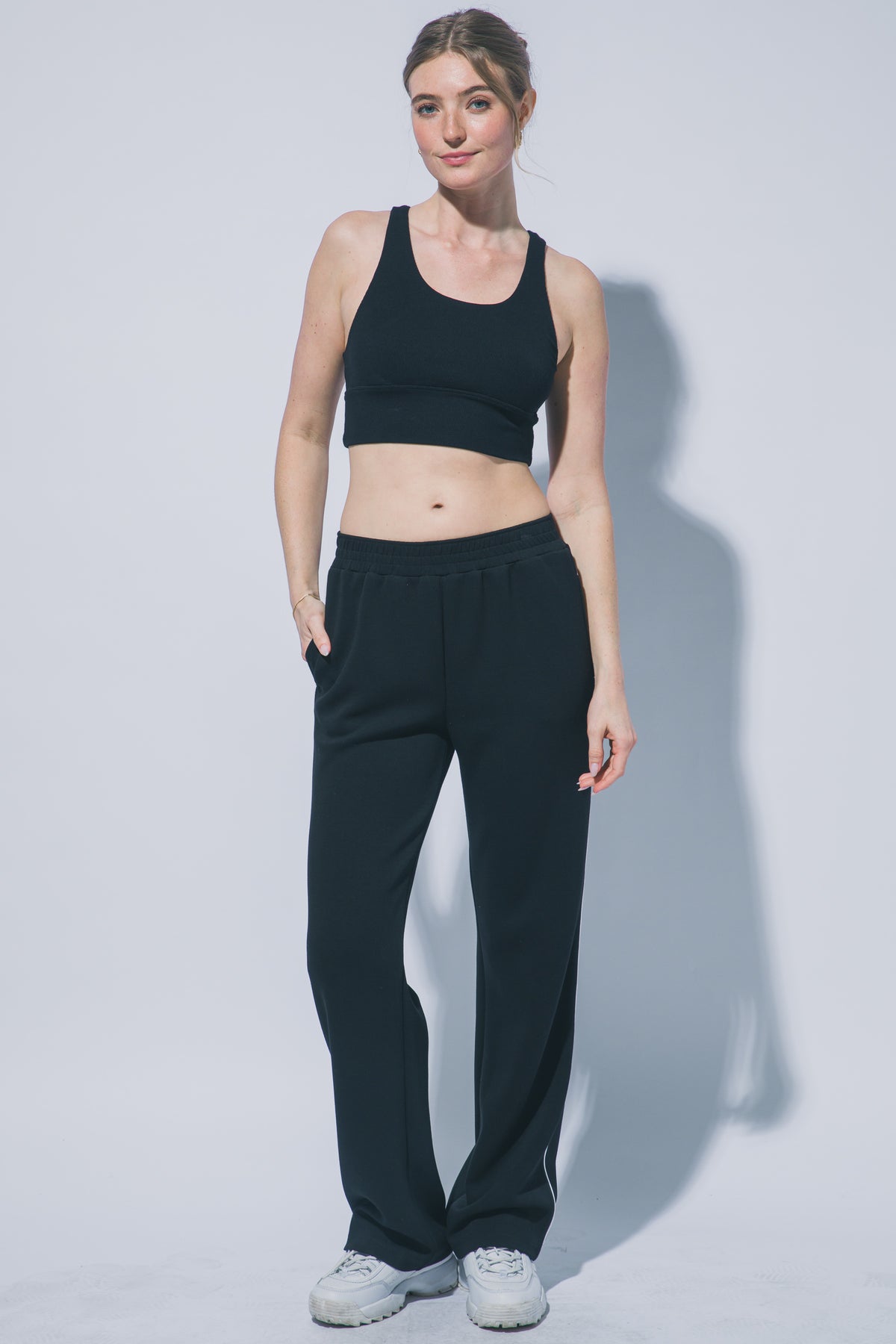 Black track pants elastic waistband detail