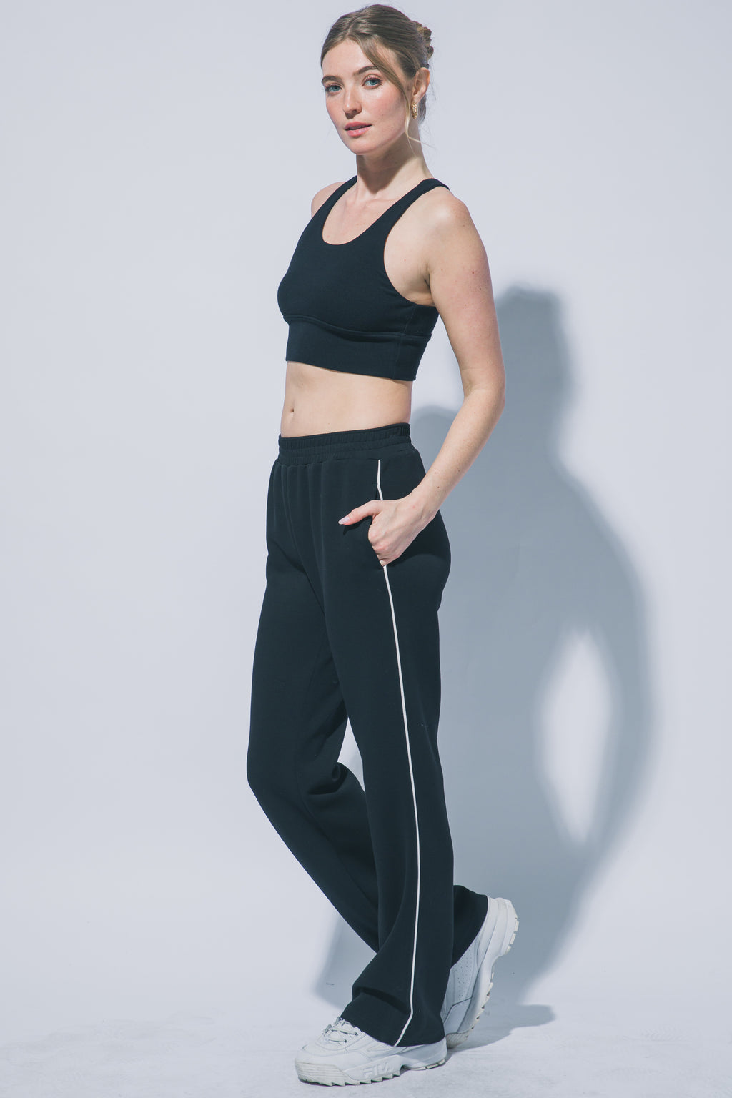 Black wide leg track pants white piping detail