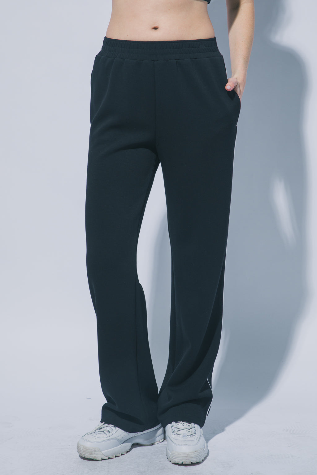 Women's black wide leg track pants - styled look