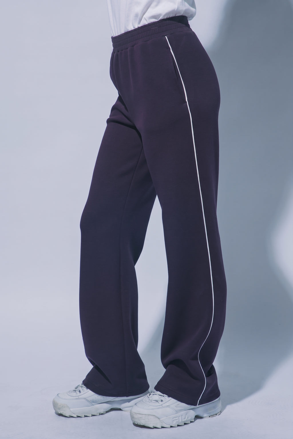 Women's burgundy wide leg track pants with white piping