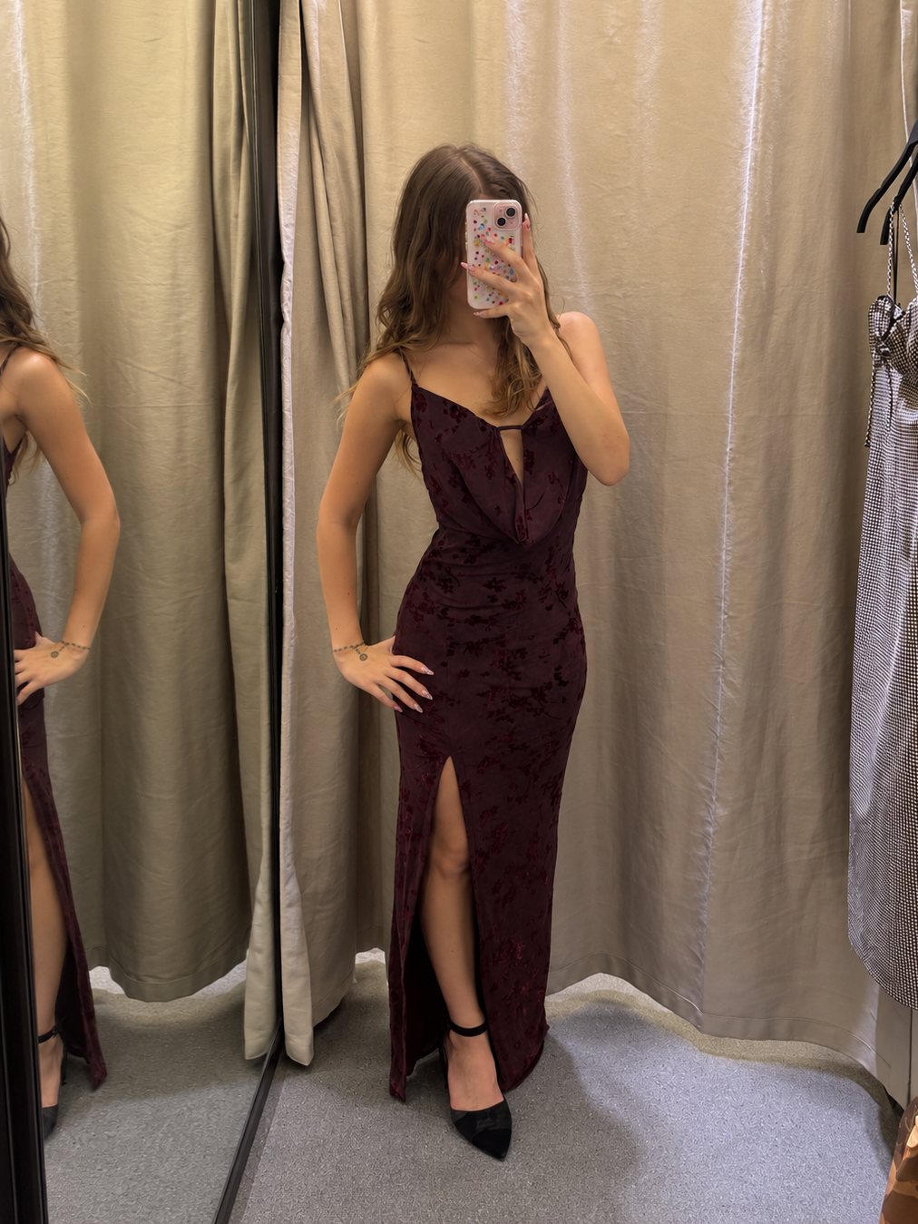 Model wearing burgundy floral flocking maxi dress