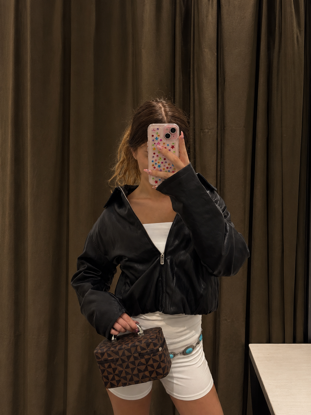 Women's black faux leather bomber jacket - styled look
